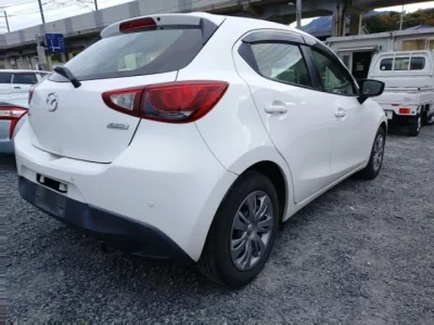 Mazda DEMIO  с аукциона в Японии