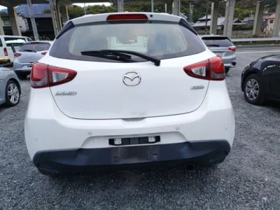 Mazda DEMIO  с аукциона в Японии