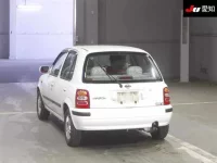 Nissan MARCH лот № 30047 оценка 3.5  с аукциона в Японии 1