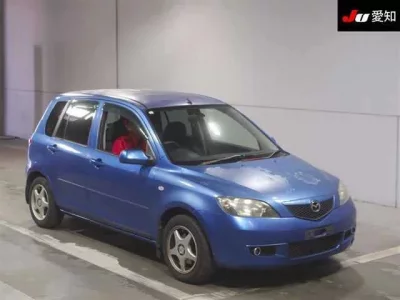 Mazda DEMIO  с аукциона в Японии