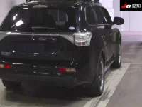 Mitsubishi OUTLANDER PHEV лот № 30847 оценка 3.5  с аукциона в Японии 7