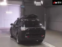 Mitsubishi OUTLANDER PHEV лот № 30847 оценка 3.5  с аукциона в Японии 1