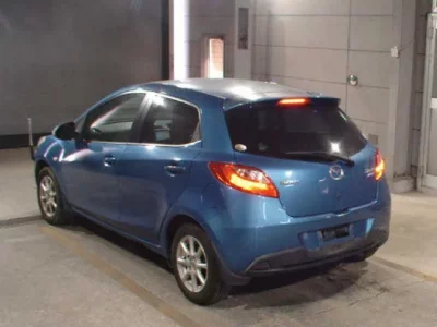 Mazda DEMIO  с аукциона в Японии