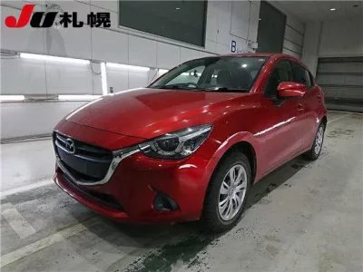 Mazda DEMIO  с аукциона в Японии