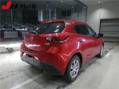 Mazda DEMIO  с аукциона в Японии