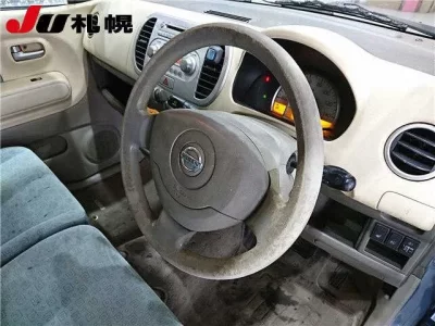 Nissan MOCO  с аукциона в Японии