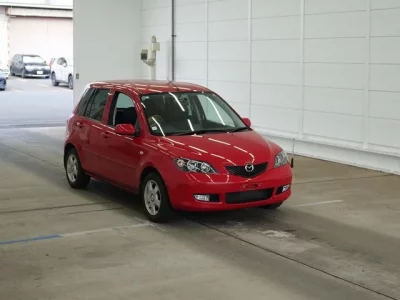 Mazda DEMIO  с аукциона в Японии
