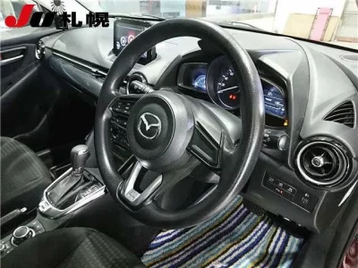 Mazda DEMIO  с аукциона в Японии