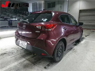 Mazda DEMIO  с аукциона в Японии