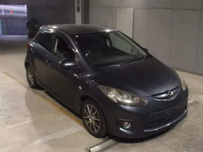 Mazda DEMIO  с аукциона в Японии
