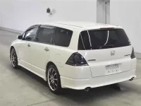 Honda ODYSSEY лот № 25058 оценка 3.5  с аукциона в Японии 1