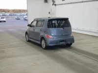 Toyota BB лот № 2304 оценка RA  с аукциона в Японии 1