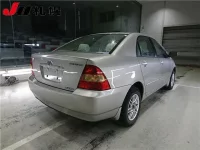 Toyota COROLLA лот № 1063 оценка 4  с аукциона в Японии 1