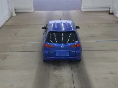 Mazda DEMIO  с аукциона в Японии