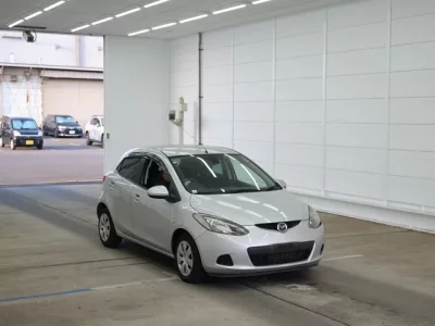 Mazda DEMIO  с аукциона в Японии