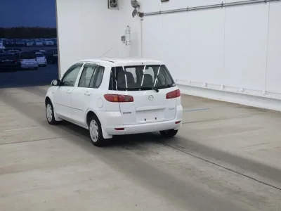Mazda DEMIO  с аукциона в Японии