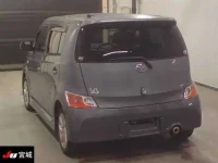 Toyota BB лот № 4086 оценка RA  с аукциона в Японии 1