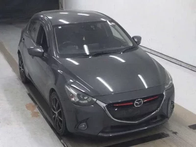 Mazda DEMIO  с аукциона в Японии