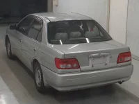 Toyota CARINA лот № 1032 оценка R  с аукциона в Японии 1
