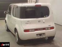 Nissan CUBE лот № 4255 оценка RA  с аукциона в Японии 1
