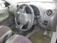 Nissan MARCH лот № 1047 оценка R  с аукциона в Японии 2