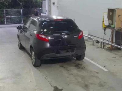 Mazda DEMIO  с аукциона в Японии