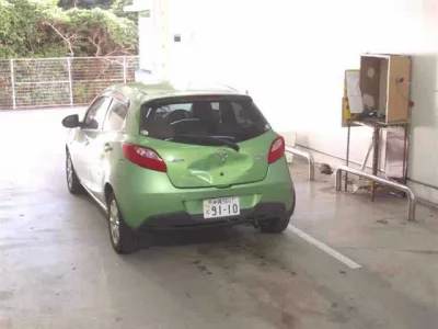 Mazda DEMIO  с аукциона в Японии