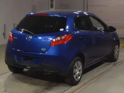 Mazda DEMIO  с аукциона в Японии