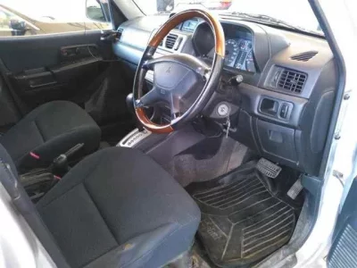 Mitsubishi PAJERO IO  с аукциона в Японии