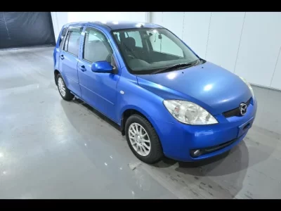 Mazda DEMIO  с аукциона в Японии