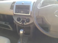 Nissan NOTE лот № 10383 оценка 4  с аукциона в Японии 8