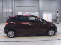 Nissan NOTE лот № 30093 оценка RA  с аукциона в Японии 2