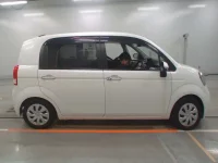 Toyota PORTE лот № 30436 оценка 3.5  с аукциона в Японии 2