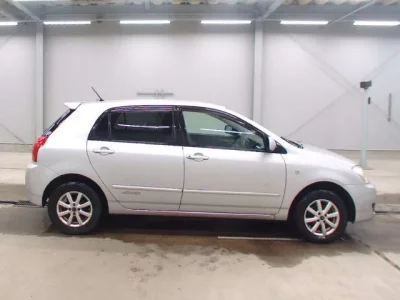 Toyota COROLLA RUNX  с аукциона в Японии