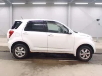 Toyota RUSH лот № 5619 оценка R  с аукциона в Японии 2