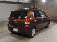 Toyota PORTE лот № 7250 оценка RA  с аукциона в Японии 1