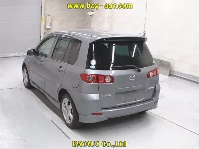 Mazda DEMIO  с аукциона в Японии