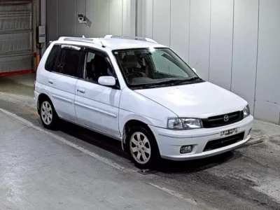 Mazda DEMIO  с аукциона в Японии