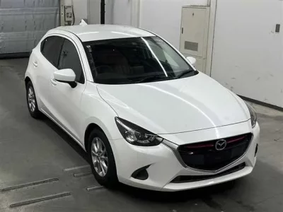 Mazda DEMIO  с аукциона в Японии