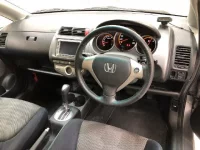 Honda FIT лот № 3710 оценка 4  с аукциона в Японии 5
