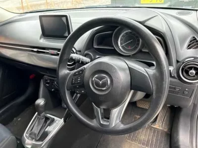 Mazda DEMIO  с аукциона в Японии
