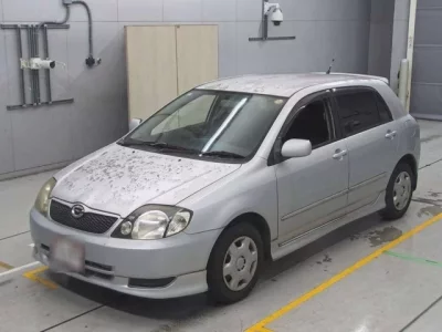 Toyota COROLLA RUNX  с аукциона в Японии