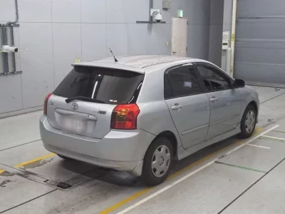 Toyota COROLLA RUNX  с аукциона в Японии