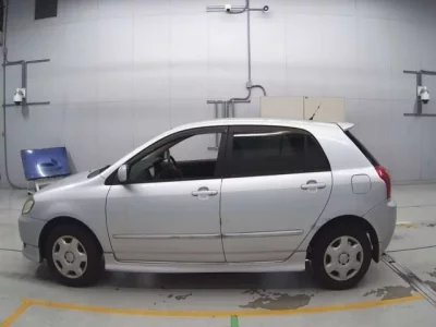 Toyota COROLLA RUNX  с аукциона в Японии