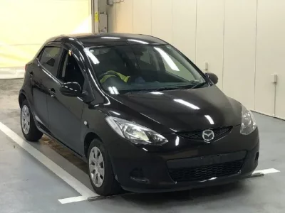 Mazda DEMIO  с аукциона в Японии