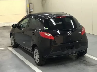 Mazda DEMIO  с аукциона в Японии