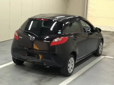 Mazda DEMIO  с аукциона в Японии