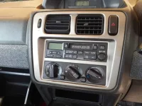 Mitsubishi PAJERO IO лот № 36368 оценка 4  с аукциона в Японии 9