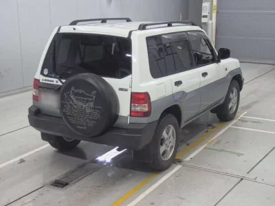 Mitsubishi PAJERO IO  с аукциона в Японии