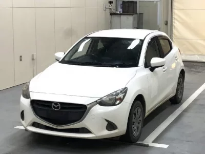 Mazda DEMIO  с аукциона в Японии